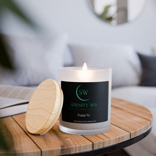 Fraser Fir soy 11oz candle in a frosted vessel with a unique wooden wick and lid. Evergreen tree, woody notes of fir and cedarwood, balanced with earthy amber and oakmoss, will make you feel right at home in a forest full of trees.