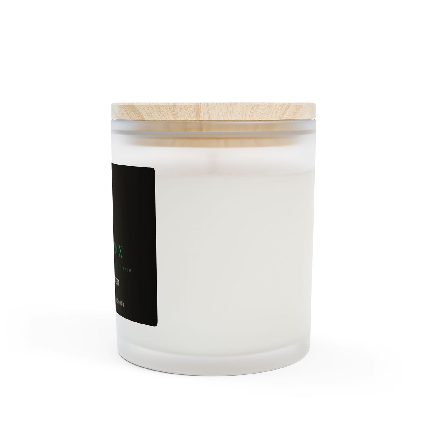 Oakmoss & Amber Frosted Glass Candle with a unique wooden wick and lid. This is a warm, woody, and earthy blend infused with notes of sage and orange. Perfect for an elegant evening.
