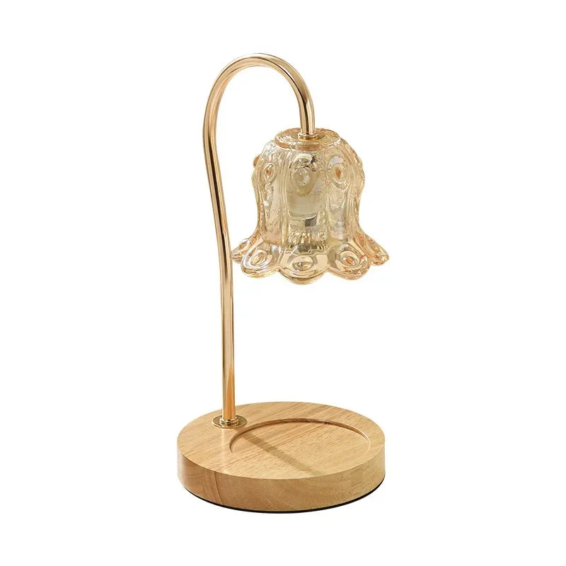 Choice of two different Candle Warmers with glass flower shade & wood base. Soft brightness to create ambiance in any room.