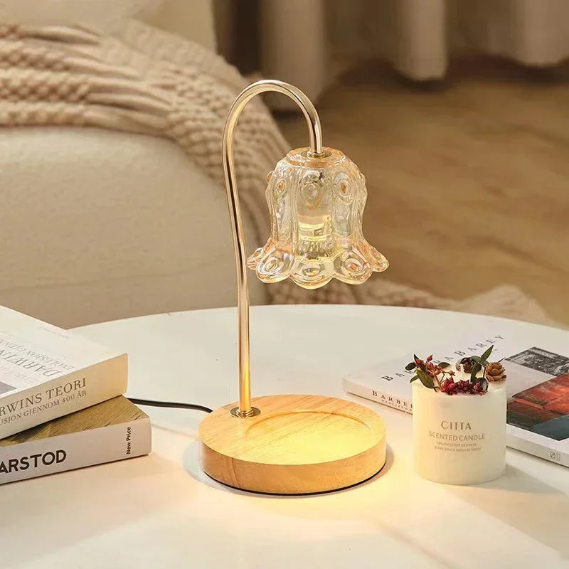 Choice of two different Candle Warmers with glass flower shade & wood base. Soft brightness to create ambiance in any room.